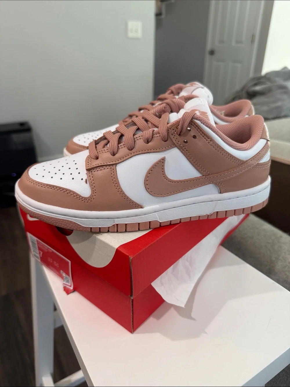 Nike Women’s Dunk Low in White and Pink Sand
